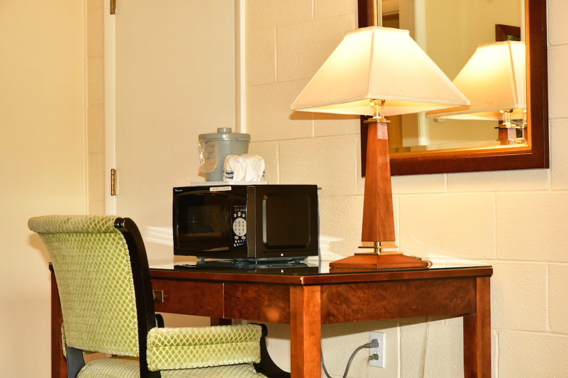 Microwave and desk in guest room at Townsend hotel